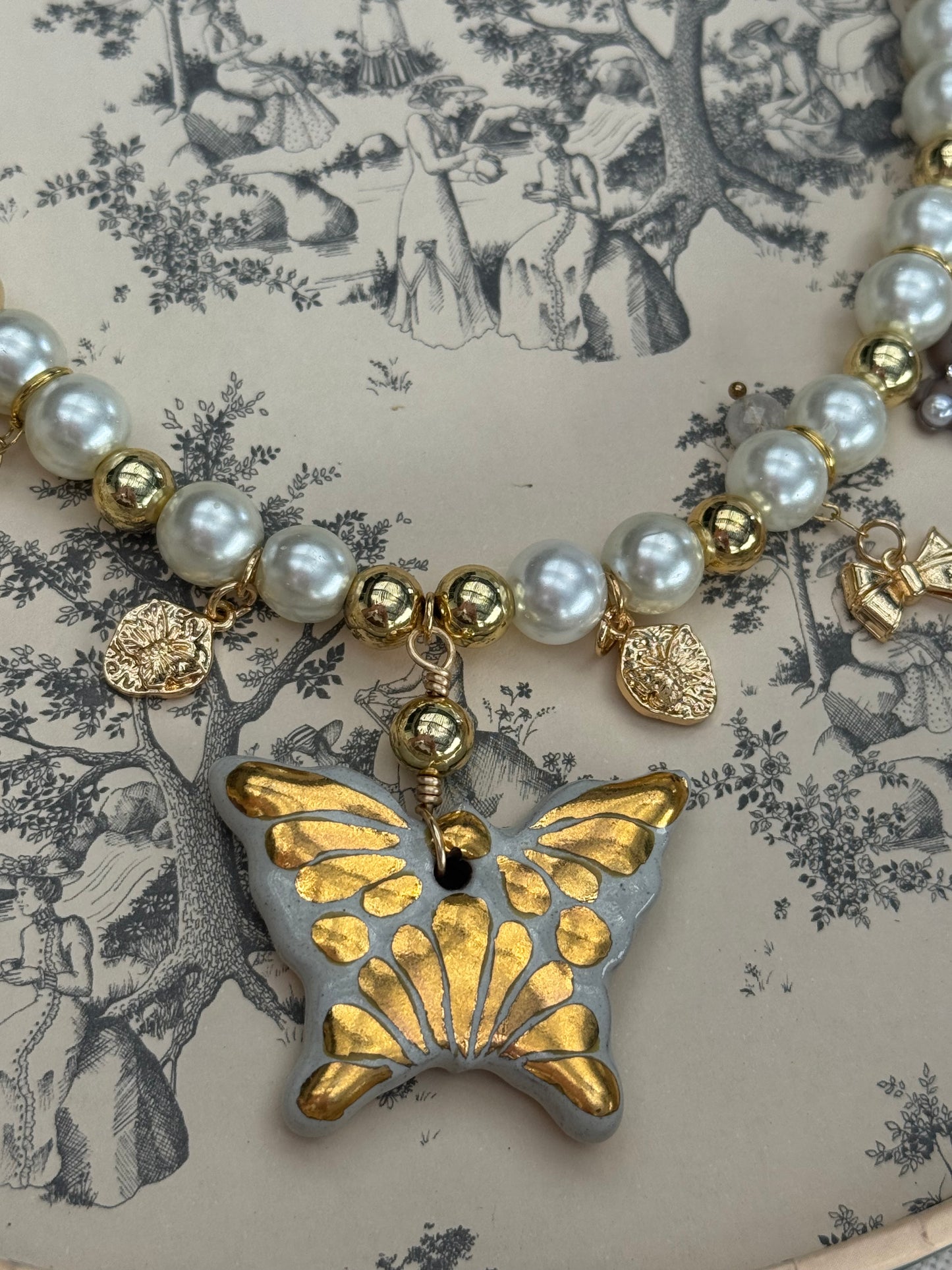 Gold butterfly necklace