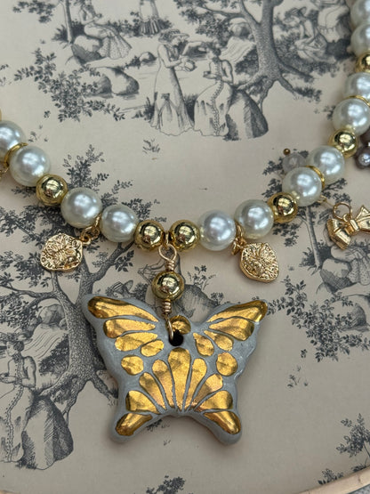 Gold butterfly necklace