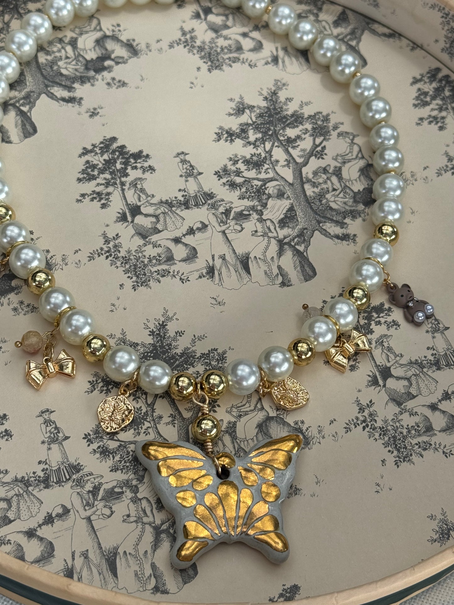 Gold butterfly necklace