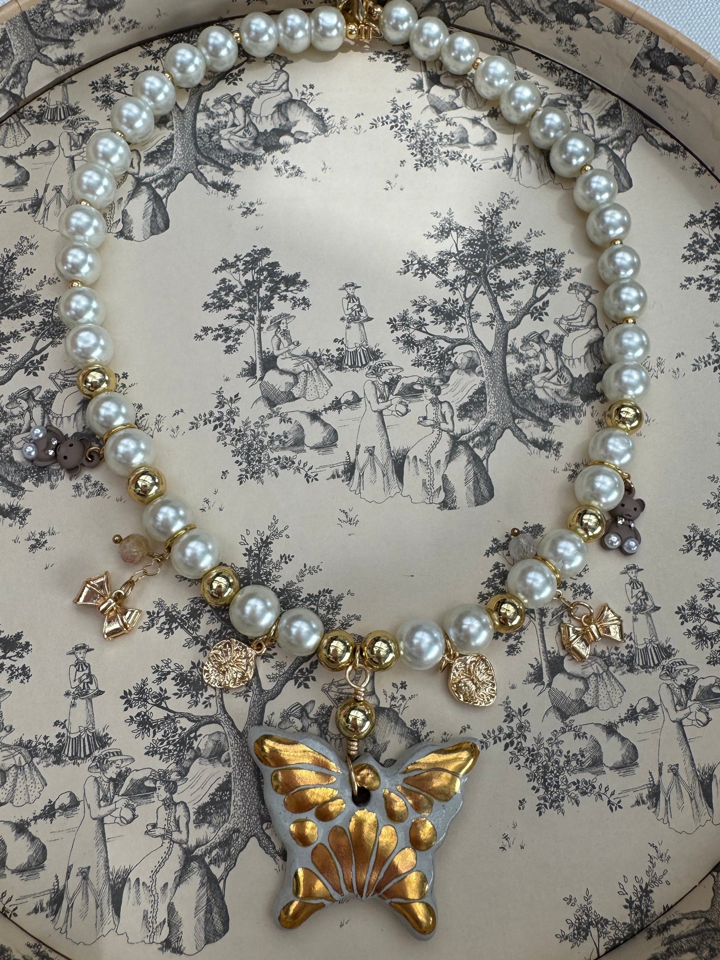 Gold butterfly necklace