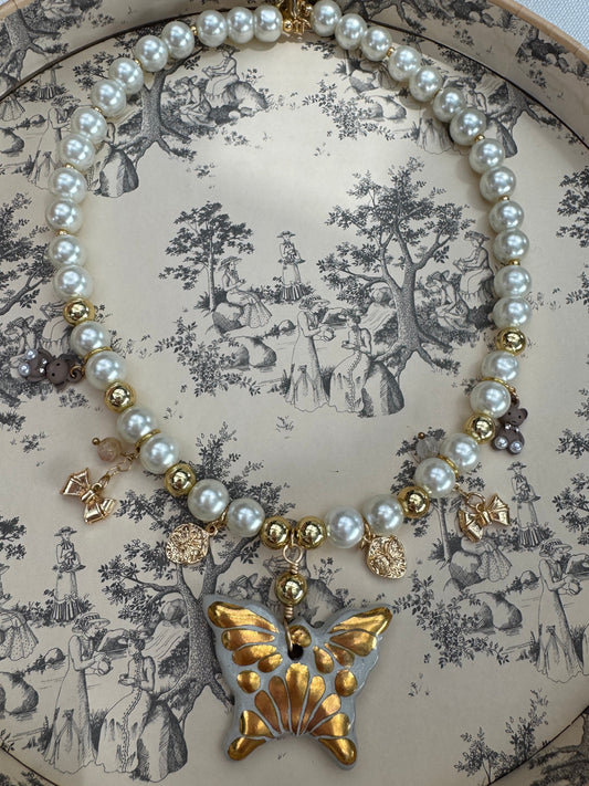 Gold butterfly necklace